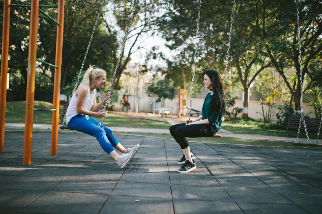 woman sitting on swing. Learning from each other