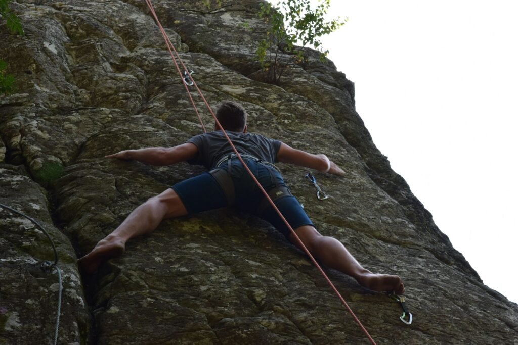 a man rock climbing